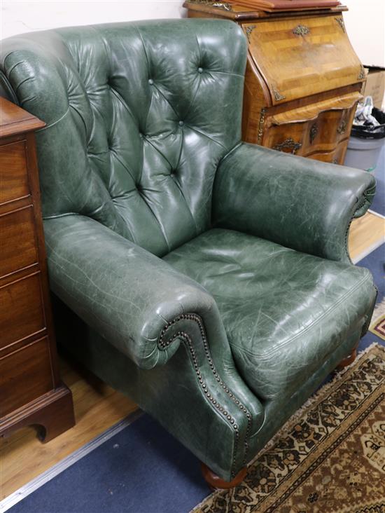 A Victorian style library chair covered in deep-buttoned hide